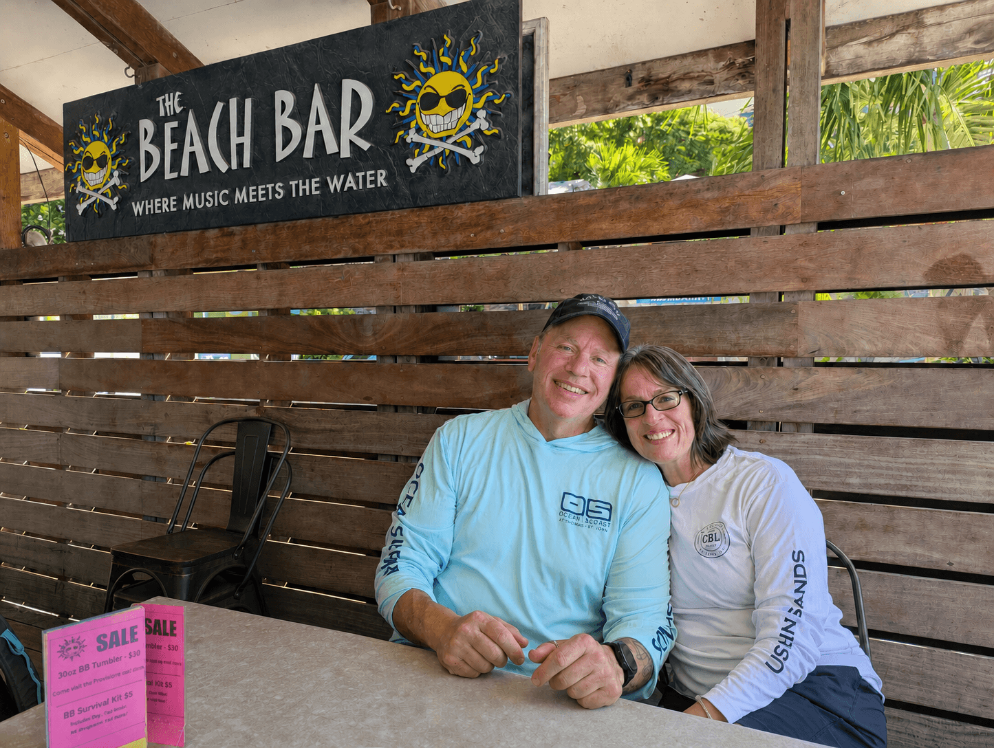 Jamie and Cindy smiling together at The Beach Bar